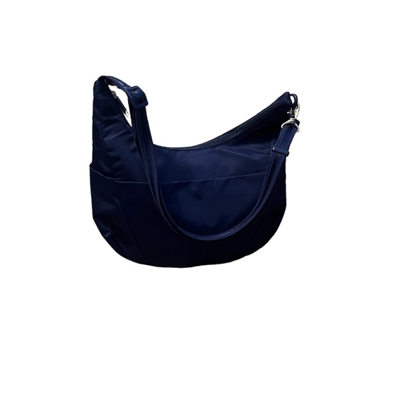 NWT Pacsafe City safe Cx Crossbody Blue Anti Theft Crossbody Moonshape Bag - Picture 12 of 16